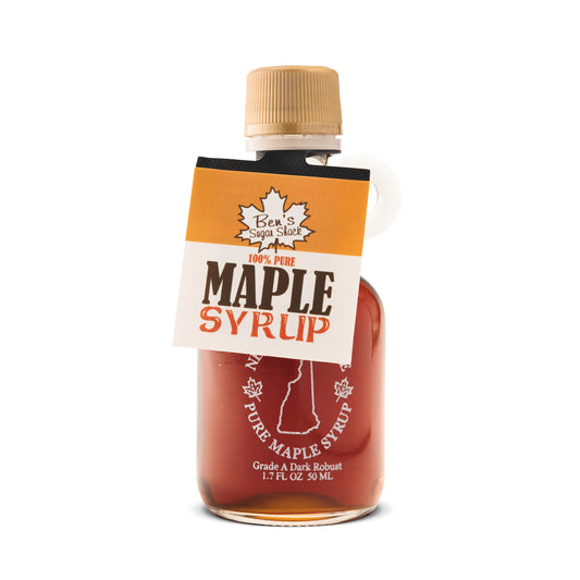 A 1.7 oz glass bottle of maple syrup from Ben's Sugar Shack.